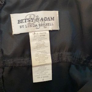 Black dress with sequins on top.